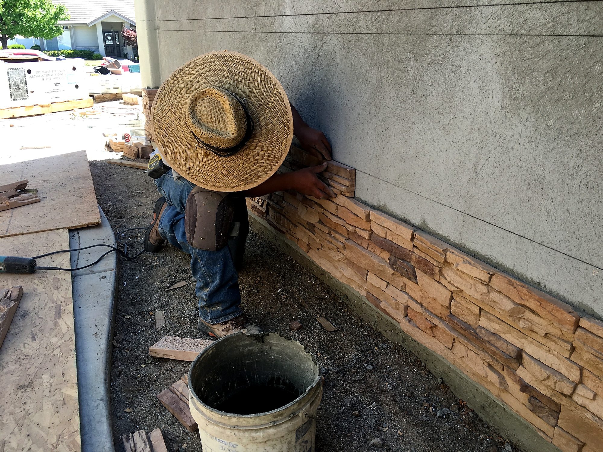 Stacked stone veneer being installed by Capps Construction