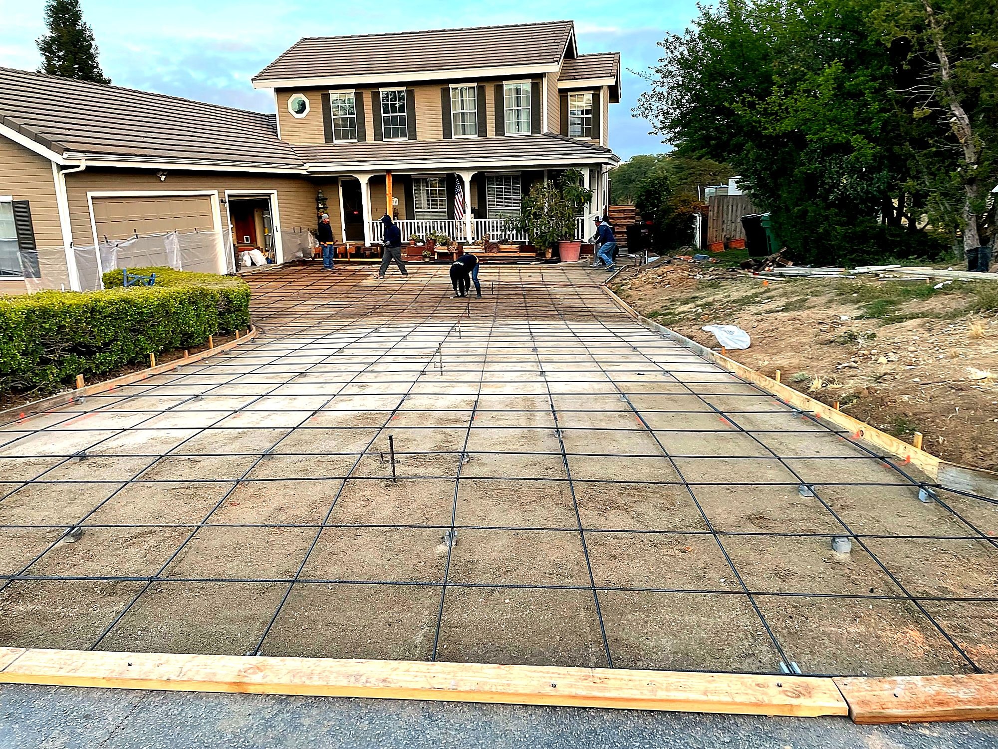 Driveway forms and rebar ready for concrete by Capps Construction