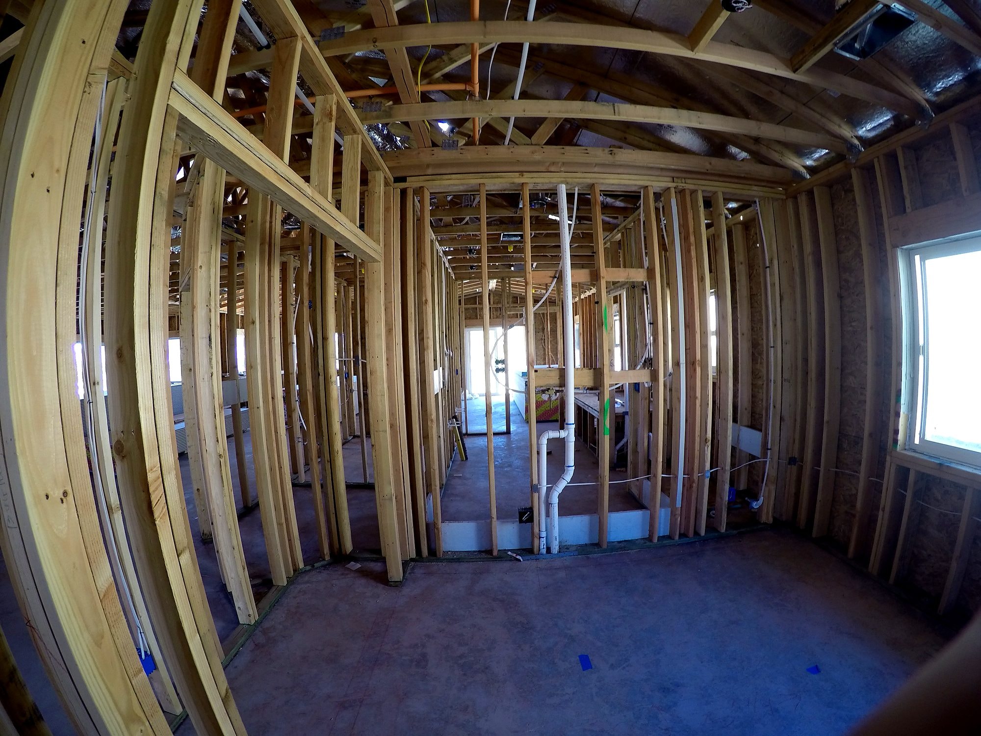 Interior framing with plumbing rough-in by Capps Construction