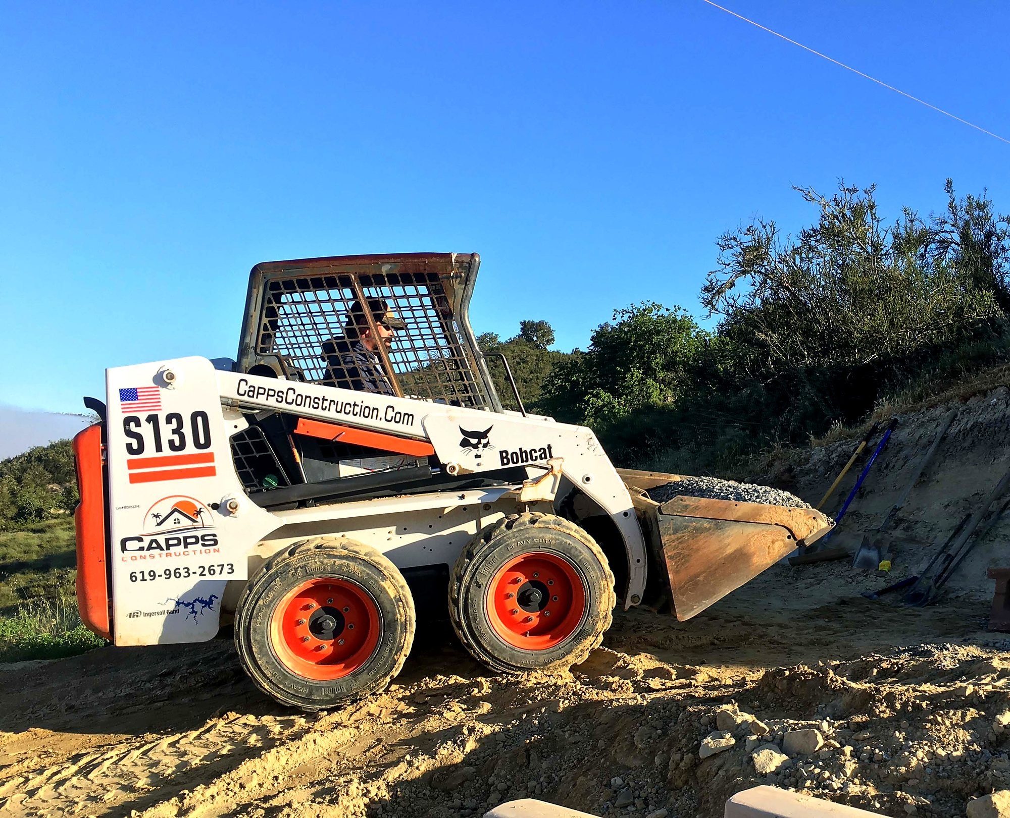 Skid steer grading and site prep by Capps Construction